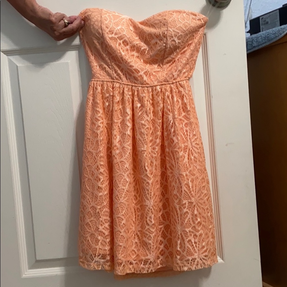 Light orange lace overlay strapless dress